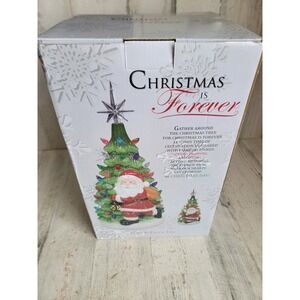 Christmas forever gather around light up Xmas tree Santa Claus figure decor